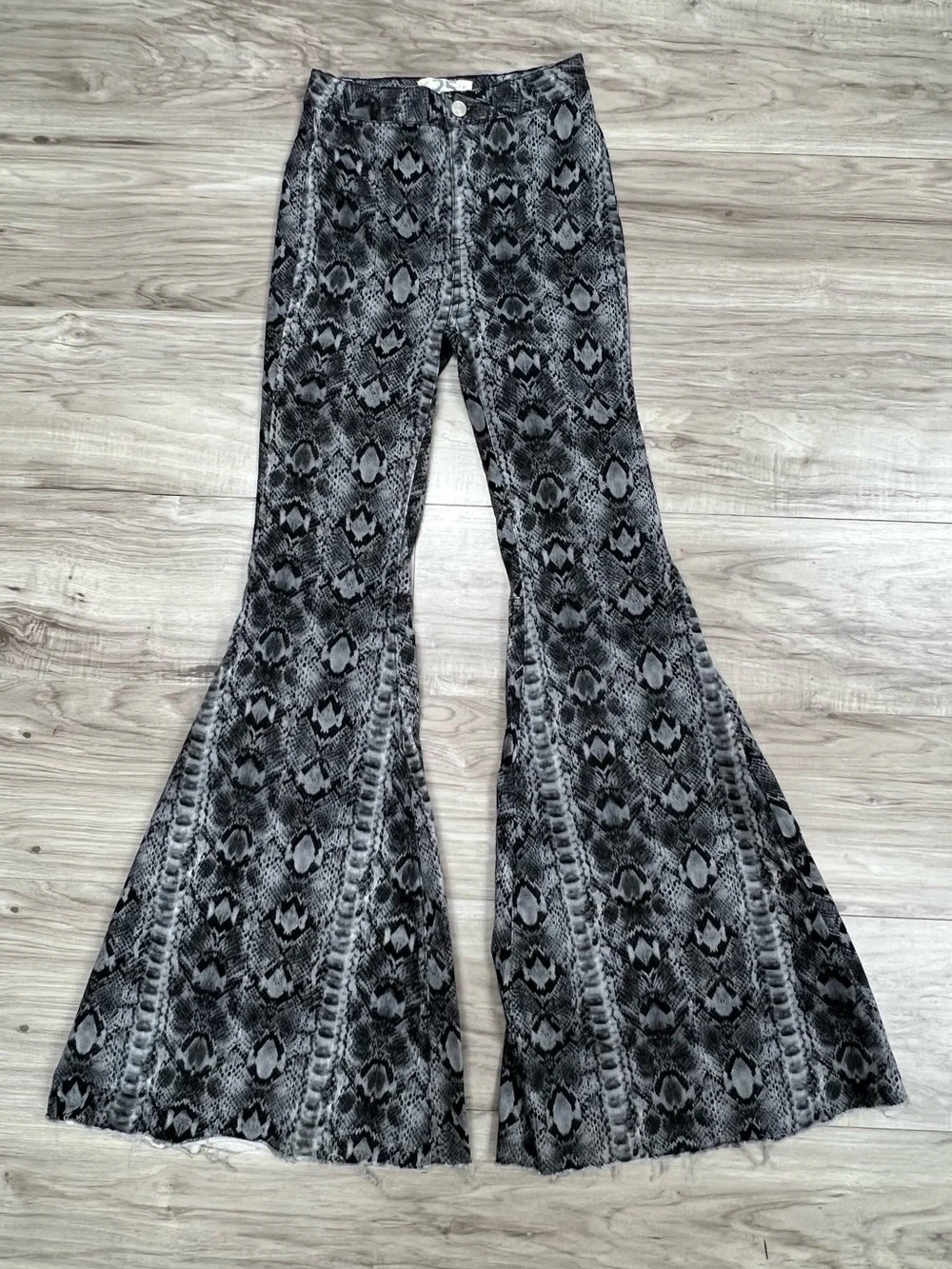 We The Free Free People Just Float On Snake Print Flare Bell Bottom Jeans